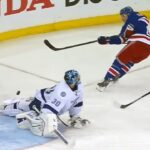 Bishop extends the left pad to stone Fast