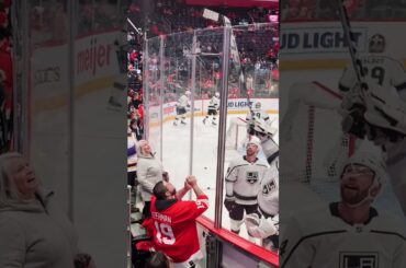 LA Kings goalie Rittich helps Gavrikov give puck to kid at Wings game! 🏒 #gokingsgo #nhl