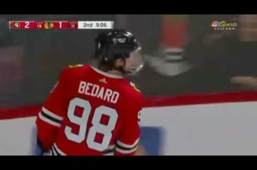 Connor Bedard sneaks one through in his second game back