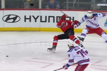 Jacob Trouba lays a big hit on Nathan Bastian