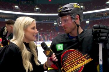 Sam Lafferty catches up with Kate Pettersen during warmups before taking on the Kings