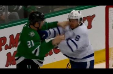 Carrick and Roussel exchange blows in spirited tilt