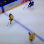Carl Hagelin Gets Crushed by Slovenia's Sabahudin Kovacevic