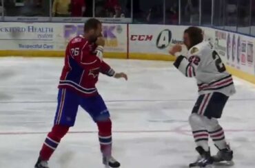 Pierre-Cedric Labrie vs Joe Finley (Rockford IceHogs vs Hamilton Bulldogs) 12-30-14