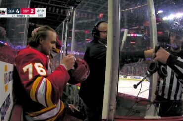 Martin Pospisil checks Vince Dunn from behind