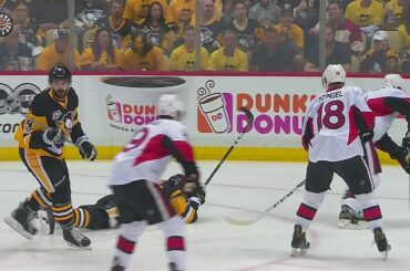 Rust leaves Game 2 after getting crushed by Phaneuf