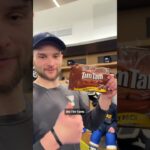 Nathan Walker introduces teammates to Tim Tams