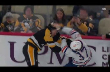 Penguins rookie John Ludvig gets an instigator penalty and a 10 minute misconduct after he dropped..