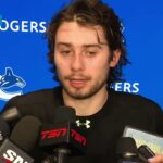 Quinn Hughes addresses the media following the win over the Jets