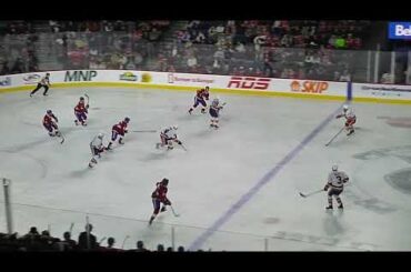 Laval Rocket's Jakub Dobeš makes a great diving glove save vs. Bridgeport Islanders' William Dufour