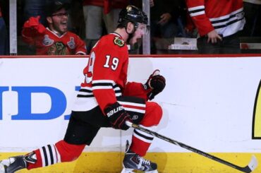 Jonathan Toews buries a one-timer past Quick