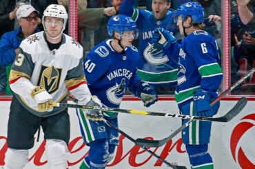 Elias Pettersson sets up Brock Boeser from the ice