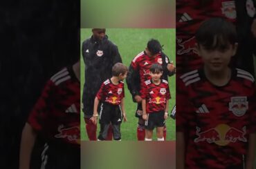 New York Red Bulls gave coats to kids standing in heavy rain | #shorts
