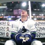 Nikita Zadorov gets a five minute major and game misconduct for boarding.