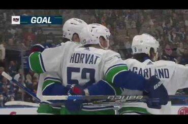 Vasily Podkolzin assists on Horvat's goal vs Leafs (12 nov 2022)