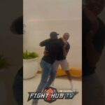 ISRAEL ADESANYA & JON JONES SPAR AFTER MEETING; BOTH GRAPPLE IN CLINCH!