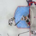 Dylan Holloway of the Edmonton Oilers scores a goal against the Vegas Golden Knights 10-04-2024