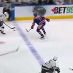 Vinnie Desharnais clean check on Drew Doughty