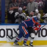 Warren Foegele clean check on Drew Doughty