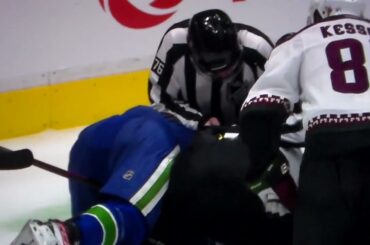 NHL hockey fight - Vasily Podkolzin(Canucks) vs. Jacob Chychrun(Coyotes)