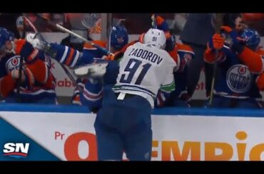 Canucks' Nikita Zadorov Absolutely Levels Evander Kane Into Oilers Bench