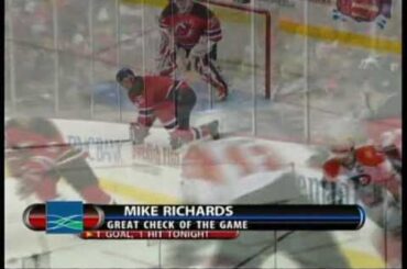 Mike Richards hits Colin White