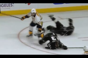 Anze Kopitar gets hit by teammate Kyle Clifford