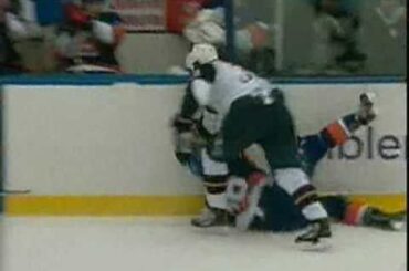 Dustin Byuglien drops Travis Hamonic