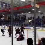 Youngstown Phantoms #31 Colin DeAugustine with a Glove save on USA #22 Kieffer Bellows