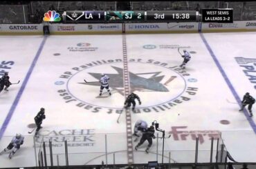 Jonathan Quick tosses puck at Logan Couture after collision