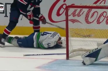 Caps' Kuznetsov High-Sticks Canucks' Burroughs