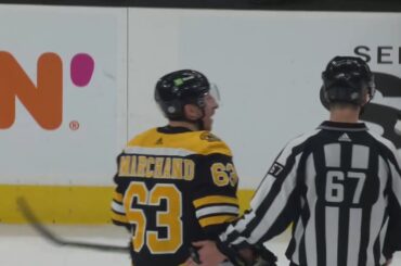 Brad Marchand and John Tavares exchange some words, following the late cross-check to Tavares