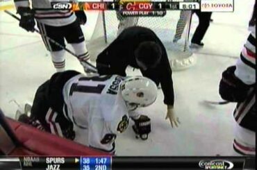 Mark Giordano crushes Marian Hossa