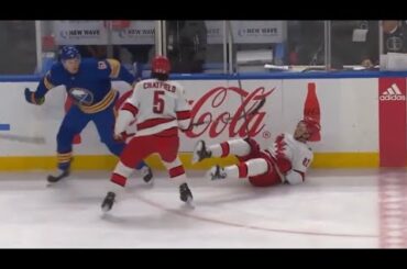 Riley Stillman throws a big hit on Jesperi Kotkaniemi