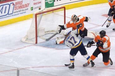 Carter Hart lunges across to rob Jaden Schwartz