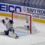 Markstrom dives back into the crease for desperation save