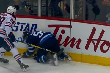 Scheifele hits boards hard after awkward fall against Oilers