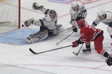 Jonathan Quick extends for spectacular fingertip save with blocker