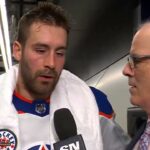 Evan Bouchard talks with Scott Oake after scoring the Game 2 OT winner for the / 10.05.2024