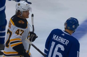 Krug, Marner exchange pleasantries behind Bruins' net