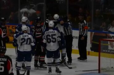 Crunch defenseman Luke Witkowski fights the Senators' Garrett Thompson