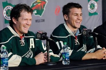 Parise, Suter Sign with Wild