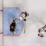 Stützle scores goal against Samuel Ersson