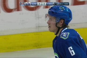 Brock Boeser scores with a no-look pass from Henrik Sedin