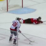 Brandon Duhaime scores a goal against the New Jersey Devils
