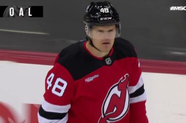 Brian Halonen scores a goal against the New York Rangers