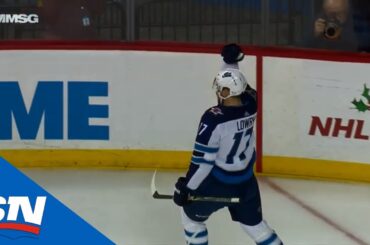 Trouba and Lowry score 21 seconds apart for Jets
