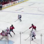 Dylan Strome scores a goal against the New Jersey Devils