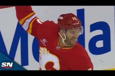 Flames' Jonathan Huberdeau Uses Shoulder To Redirect Puck Past Ivan Fedotov