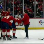 Adam Boqvist hit in head with puck